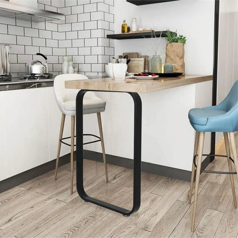 Slick 28 Inch Heavy Duty Metal Table Legs For Dining Tables And Benches Rock Solid Industrial Desk Replacement Bars Built Tough Cold Rolled Steel With Protective Floor Guards seen in modern kitchen setting.