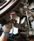 Premium 20 Piece Grease Fitting Kit With Straight Nozzle Tips And Rubber Caps For Tough Auto Maintenance, Precision Zerk Tools That Make Car Care Simple And Smooth For All Your Vehicle Repair Needs. undercarriage grease fitting with straight nozzle tip and blue hose in automotive repair