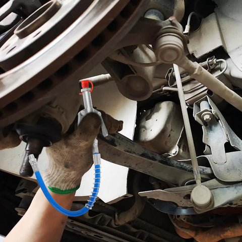 Premium 20 Piece Grease Fitting Kit With Straight Nozzle Tips And Rubber Caps For Tough Auto Maintenance, Precision Zerk Tools That Make Car Care Simple And Smooth For All Your Vehicle Repair Needs. undercarriage grease fitting with straight nozzle tip and blue hose in automotive repair