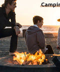 Person using 32 Inch Heavy Duty Campfire Poker With Wooden Handle For Fire Pit Outdoors Or Indoors Camping Fireplace Bonfires Rust Resistant Portable