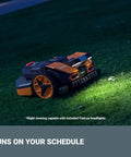 Landroid Vision Robotic Lawn Mower With AI Deep Learning HDR Camera mowing grass at night, equipped with FiatLux headlights