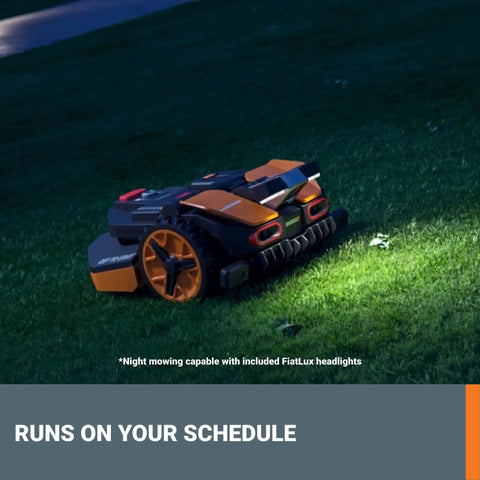 Landroid Vision Robotic Lawn Mower With AI Deep Learning HDR Camera mowing grass at night, equipped with FiatLux headlights