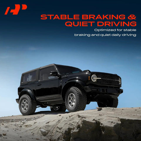 Black off-road vehicle on rocky terrain, text 'Stable Braking & Quiet Driving' in background