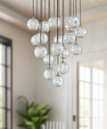 21 Inch 18 Light LED Multi Pendant Chandelier In Natural Brass Featuring Clear Ribbed Acrylic Shades A top shelf dining room centerpiece.