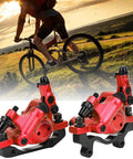 Rock Solid Top Tier Hydraulic Disc Brake Set Featuring Two Way Paddle Levers And Sturdy Aluminum Alloy Calipers For Front Rear Mountain Bike Ebike Setup Ready To Roll In Bright Red Finish, shown on a mountain bike.
