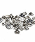 Premium Lock Pin Backs For Lapel Pins Nickel Plated Brass 50 Pack Secure Metal Clutch Fasteners scattered in a pile.