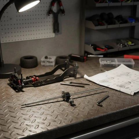 RC Car Rear Differential Assembly Replacement Kit With 12T Pinion Gear Set And Steel Metal Components For Smooth Power Transfer And Stable Traction On Rough Tracks And Fast Drivetrains. on workbench