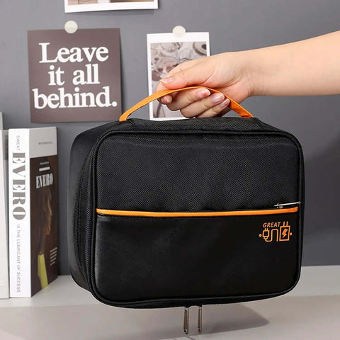 Heavy Duty Badass Electronics Organizer Bag For Travel Cables Chargers Power Bank Cell Phone Gear Hauler with orange handle.