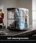 Kismile nugget ice maker countertop, portable silver unit with transparent housing and front control panel.