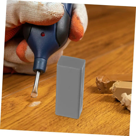 Wood Floor Repair Kit With Wax Blocks For Quick Scratch Fixes on hardwood surface showing tool and wax application