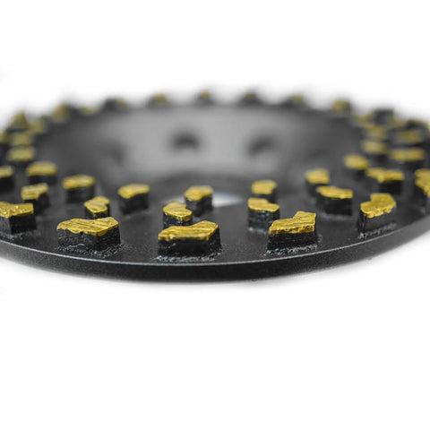 Close-up of 7 Inch Diamond Cup Grinding Wheel for Concrete and Coatings Removal with CDB Technology, gold cluster segments visible