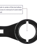 Detailed view of cam pulley holder showing central hole for crankshaft bolt removal, used in Cam Pulley Holder And Crankshaft Damper Locking Tool For Lexus And Toyota Engines, Harmonic Pulley Tool For Camry, 3.0L V6, 4.7L V8 And Other OHC Motors.