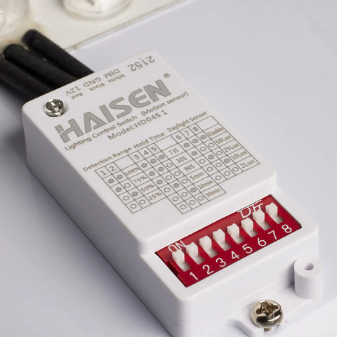 Close-up of Haisen lighting control switch for Next-Level Color Temperature Selectable LED Flush Mount Ceiling Light with Motion Sensor.