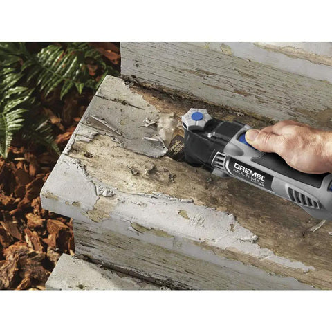 Reconditioned Corded Oscillating Multi Tool Kit Featuring Durable Metal Frame Engineered For Sharp Cutting Sanding Scraping And Grinding Plug And Play Workhorse Built Like A Dang Tank To Finish Jobs Fast, used for scraping damaged wood.