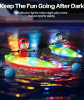 Two Pack Remote Control Boats For Kids Ages 6 To 12 With Dolphin Ball Catching Nose and LED lights in a pool at night