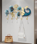 Sleek Wall Mounted Coat Rack With Extended Hook Arms For Entryway, modern design with decorative elements and bags.