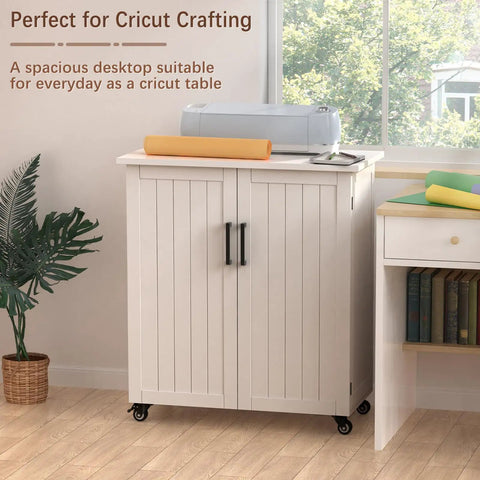 Rolling Craft Cart With Storage Cabinet And Drawers For Cricut Projects next to a desk with Cricut machine on top