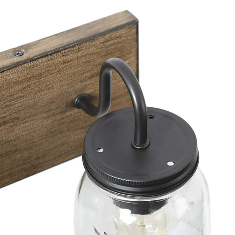 Farmhouse Mason Jar Bathroom Vanity Lights With Faux Wood Backplate In Warm Brown Finish, close-up on jar and backplate detail
