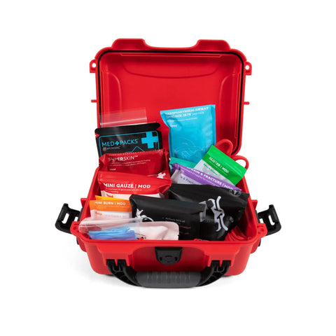 Open red Mini Pro Waterproof First Aid Kit For Car, Home, Boat, Camping And Travel showing various medical supplies.