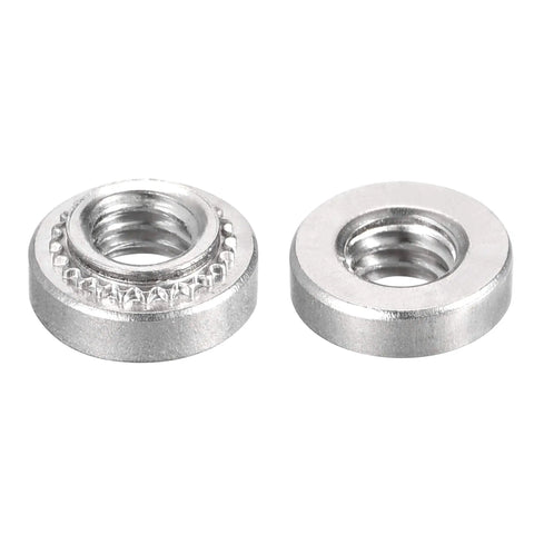 Premium Stainless Steel Rivet Nuts With Round Heads For Sheet Metal Fabrication, 0.14 Inch Length, #8-32 threads, two shown.