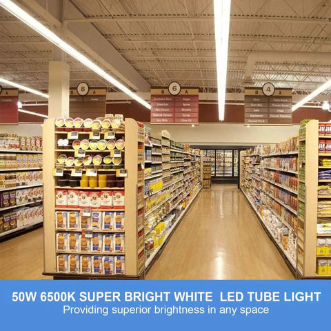 Supermarket aisle lit by 10Pack 4Ft LED Shop Light 50W 8000LM 6500K Linkable T8 Tube With Clear Cover, enhancing product visibility.