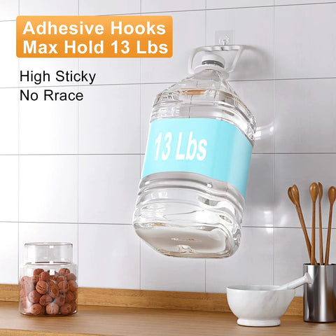 Heavy Duty Adhesive Hooks 12 Pack Holds Up To 13 Lbs Each Waterproof No Nail Wall Hangers displaying 13 lb jug in kitchen
