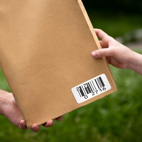 Heavy Duty Thermal Transfer Shipping Labels 2 X 1 Inches on a package with a clear barcode for easy scanning.