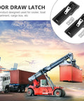 Heavy Duty Black Rubber Draw Latch With Stainless Steel Hook Secure Vibration Free Closure For Boat Compartment Cooler And Cargo Box displayed on a backdrop of a shipping yard.