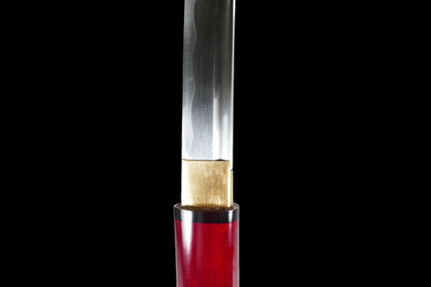 Close-up of the blade and scabbard of a Burgundy Red Shirasaya Samurai Katana Dope Hand Honed High Carbon Steel Razor Sharp 27 Inch Blade