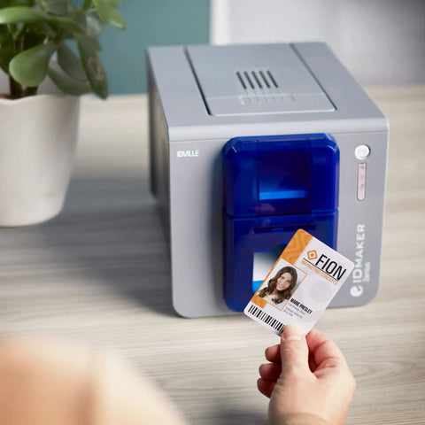 Single Sided Id Card Printer Boasting Quick Full Color Pvc Badge Printing With Smooth Lcd Touchscreen Navigation No Sweat Desktop Layout For Small Teams Crushing Daily Pass Creation Goals with PVC badge in hand.