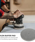 High Performance Nylon Buffing Wheels For Metal And Hardware Polishing Compatible With Bench Grinders To Shine Stainless Steel Copper Aluminum And Stone Fast At 7p Hardness being used on a bench grinder.