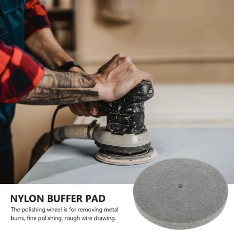 High Performance Nylon Buffing Wheels For Metal And Hardware Polishing Compatible With Bench Grinders To Shine Stainless Steel Copper Aluminum And Stone Fast At 7p Hardness being used on a bench grinder.