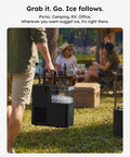 No Sweat Countertop Nugget Ice Maker With Easy Grip Handle Produces Up To 38 Pounds Of Chewable Ice Daily being carried outdoors.