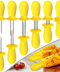 Six Pairs Stainless Steel Corn Holders Set for easy grub grabs on the cob, with yellow silicone handles on a wooden board.