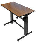 Height Adjustable Standing Desk Supporting Dual Screens And Tablets Heavy Duty Sit Stand Workstation Smooth Manual Crank Adjustment 48 By 24 Inch Rich Walnut Surface, side view.