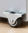 Dead Quiet Low Profile Caster Wheels Four Pack Rock Solid Furniture Casters With Durable Tpe Tires Flat Top Plate Mount showing mounted caster on furniture.
