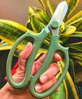 Pro Grade Garden Pruning Scissors With Comfort Grip Handle Set Razor Sharp SK5 Stainless Steel against green plant