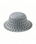 Top view of a gray bathtub drain strainer silicone bathroom stopper fixture with a dome shape and perforated design.