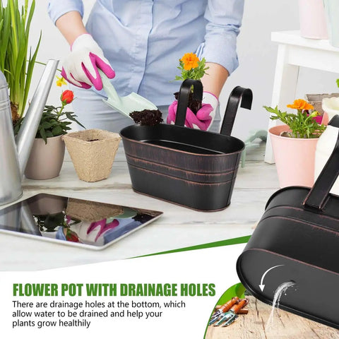 4 Pack Black Metal Hanging Flower Pots To Level Up Railing Decor Iron Planters With Drain Holes, shown during planting.