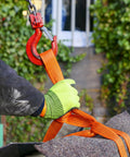 Worker using Two Pack 2 Inch By 10 Foot Heavy Duty Lifting Slings Nylon Web Slings 15,000 Lb Capacity Double Ply Winch Straps