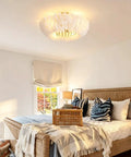 20" Feather Decor Flush Mount Ceiling Fan with Remote, 6 Speed Reversible DC Caged Ceiling Fan Light Combo in cozy bedroom.