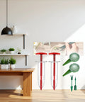 Six Piece Mini Seed Spreader Set for Tiny Seeds showing handheld seed dispensers and garden tools on wooden table.