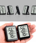Two Pack Indoor Thermometer And Humidity Monitor With Digital Temp And Humidity Gauge, Real Time Readouts, Battery Included, Ideal For Home, Baby Nursery, Reptile Enclosures, And Greenhouses. Two black digital monitors with kickstands shown front and side