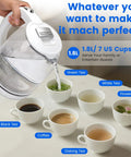 Person using 1.8L glass electric kettle pouring water into tea cups with different labels, 360-degree base visible.