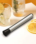 8 Inch Stainless Steel Cocktail Muddler For Mojitos And Fruit Drinks Heavy Duty Bar Tool For Home Bar And Kitchen Lemon Smasher Easy To Clean Pro Grade Ice Crusher Bartender Accessories on a table with lemon slices