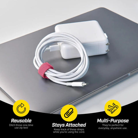 Macaron 40 Pack Self Gripping Cable Ties With 5 Inch And 8 Inch Straps securing a cable on a laptop with charger.