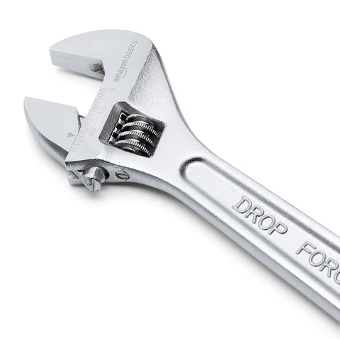 Close-up of a chrome-plated adjustable wrench with inch and metric scale from a 4 Piece Chrome Plated Adjustable Wrench Set With Inch And Metric Scale For Auto Repair, Plumbing, And General Maintenance Includes 6, 8, 10, 12 Inch Wrenches.