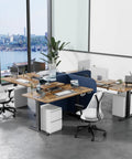 Heavy Duty Electric Standing Desk With Dual Memory Buttons And Rock Solid Brown Surface Seriously Built Tough For Gaming And Remote Work Grind Super Smooth Motor Lift Keeps Your Spine Happy in an office setup with multiple desks and ergonomic chairs.