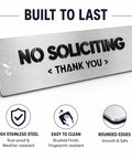 Dead Serious No Soliciting Sign Crafted From Brushed 304 Stainless Steel features raised lettering and rounded edges.