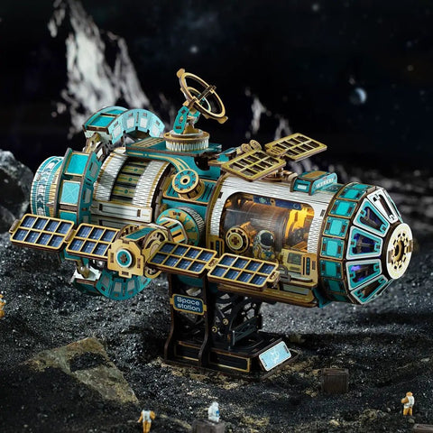 Interstellar Space Station 3D Wooden Puzzle Kit With Lights And Music, 511-Piece DIY Mechanical Model For Adults, No Glue Snap-Fit Build, Totally Rotating Space Station Desk Decor, STEM Sci-Fi Gift For Puzzle Lovers. Wooden space station model with solar panels and lights.